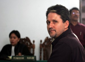 File picture shows Brazilian citizen Marco Archer Cardoso Moreira sitting in front of his lawyer at Tangerang court, near Jakarta